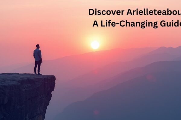 Person standing on mountain cliff at sunrise, symbolizing clarity and balance through arielleteabout.