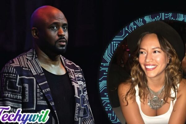 Wayne Brady standing on stage beside a smiling woman, Diana Lasso, in a stylized digital collage.