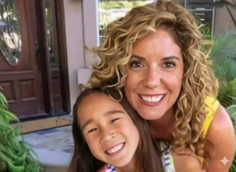 Francine Sinatra Anderson smiling outdoors with a young girl