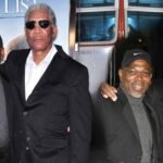 Saifoulaye Freeman with his father Morgan Freeman at a public event, both dressed in black suits and sunglasses