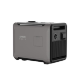 A gray Anker Solix portable power station with a sleek matte finish, showing ports on the right side. It has a modern, sturdy design.