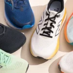 A variety of running shoes displayed together, showcasing different colors and styles for optimal comfort and support in running