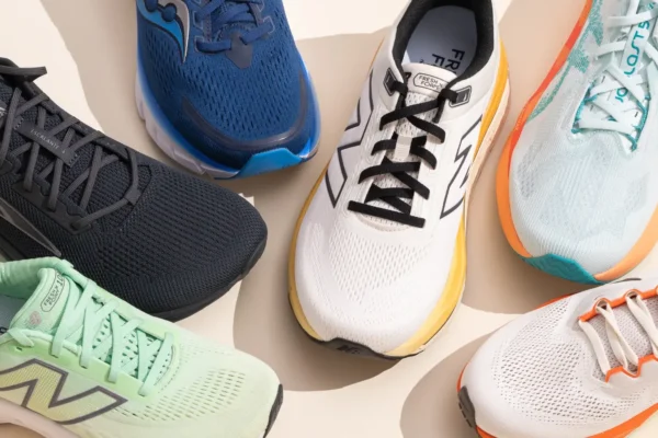 A variety of running shoes displayed together, showcasing different colors and styles for optimal comfort and support in running