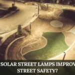 Aerial view of a park pathway illuminated by LED Solar Street Lamps, improving nighttime visibility and safety for pedestrians and nearby streets.